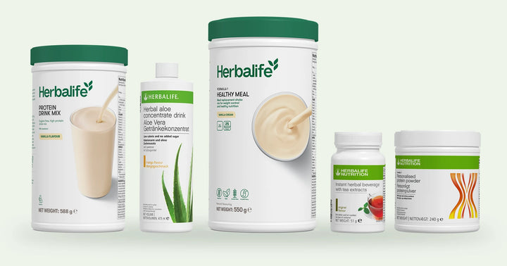 Protein Drink Mix, Herbal Aloe Concentrate, Formula 1 Healthy Meal, Instant Herbal Beverage and Formula 3 on a shelf